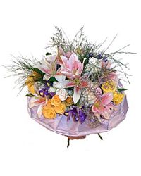 bouquet of roses lilies and irises